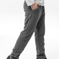 pantaloni Fliss sportivi gri pentru bărbați, cu buzunare frontale și croială standard – ideal pentru confort pe termen lung