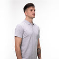 Tricou polo gri deschis, model versatil pentru angajați și echipe sportive.
