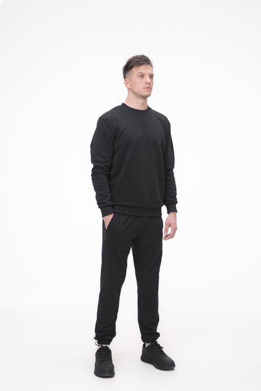 Pantaloni negri cu elastic pentru bărbați, model confortabil și practic – vedere frontală.