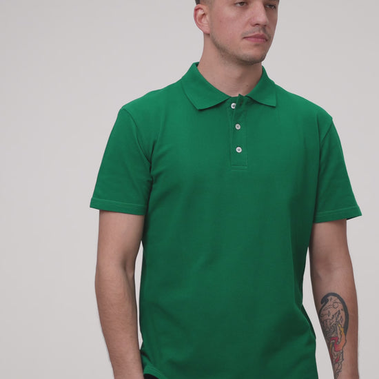 Tricou polo verde închis din bumbac, model confortabil pentru echipe și companii.