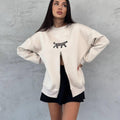 Hanorac bej cu fermoar și print de leopard pentru femei, stil lejer și modern, ideal pentru ținute casual.